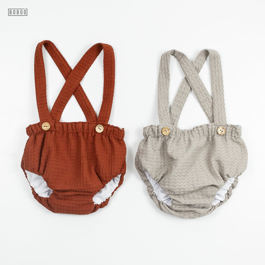 Cubrepañal con tirantes Topo cuerpea